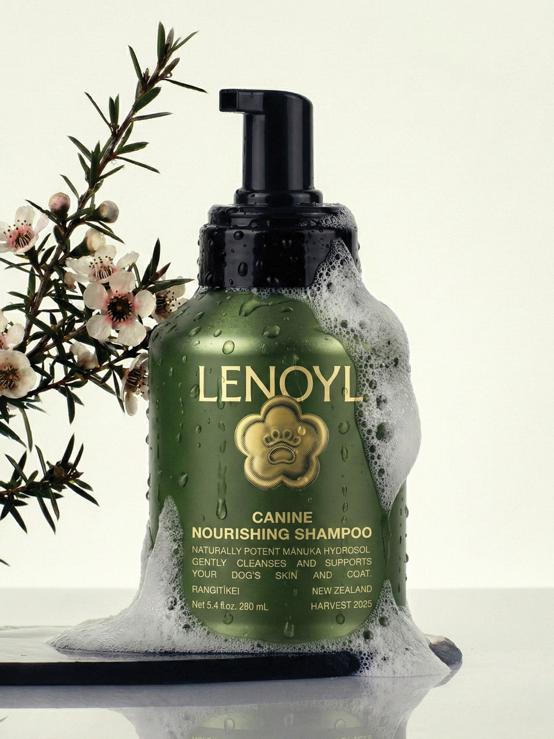Lenoyl canine nourishing shampoo bottle with floral background