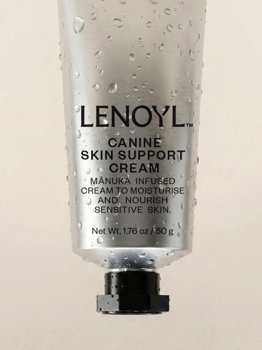Lenoyl Canine Skin Support Cream bottle on a beige background